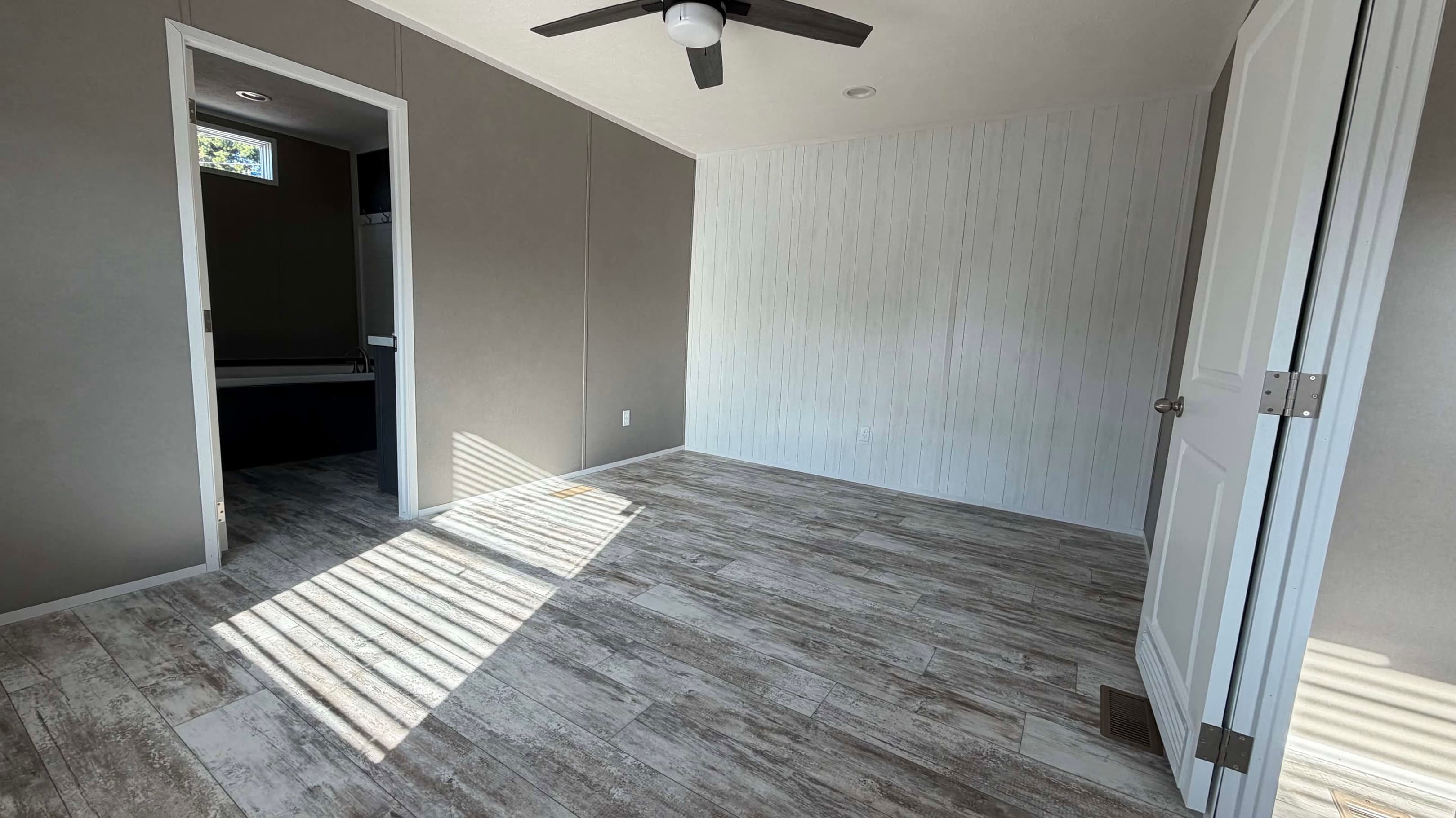 The driftwood bedroom home features